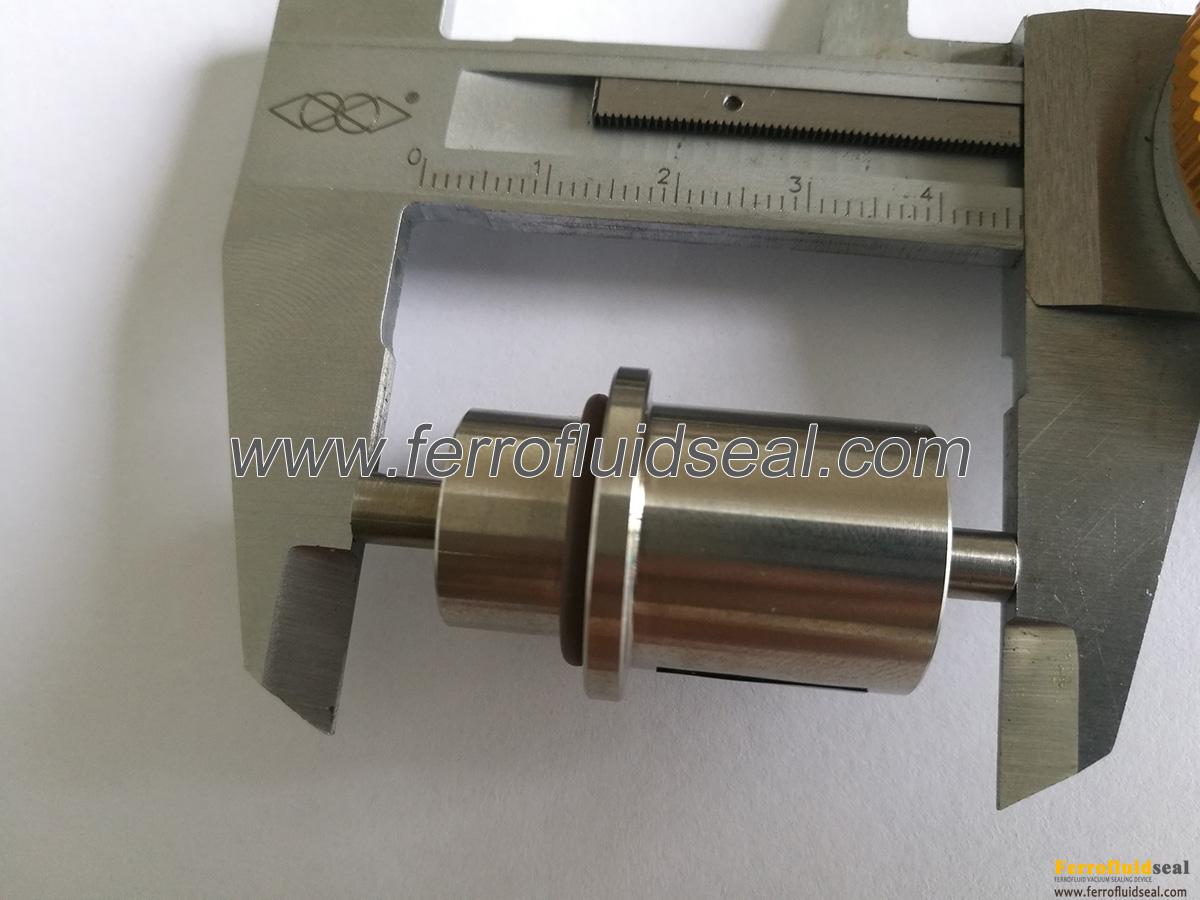 miniature vacuum ferrofluid feedthrough